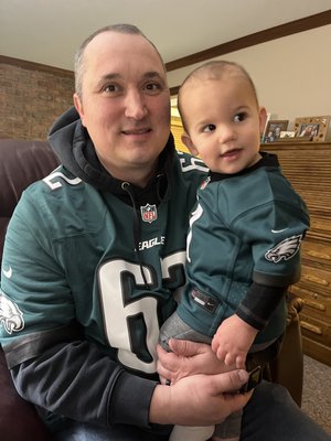 Ryan Kellermeyer and son in Eagles jerseys